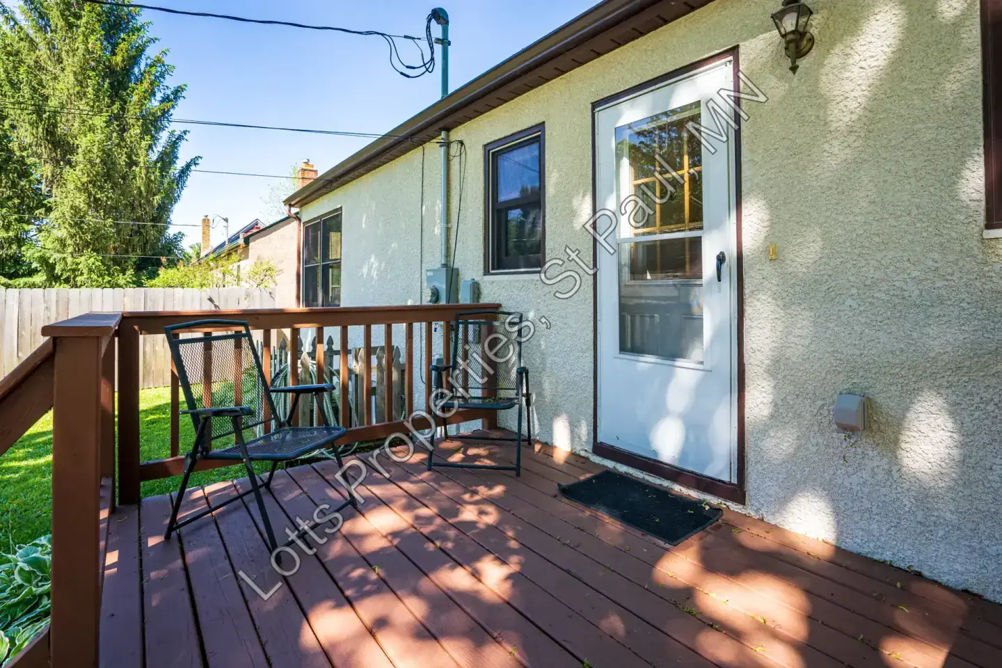 Back entry deck and rear door at 1443 Saint Albans