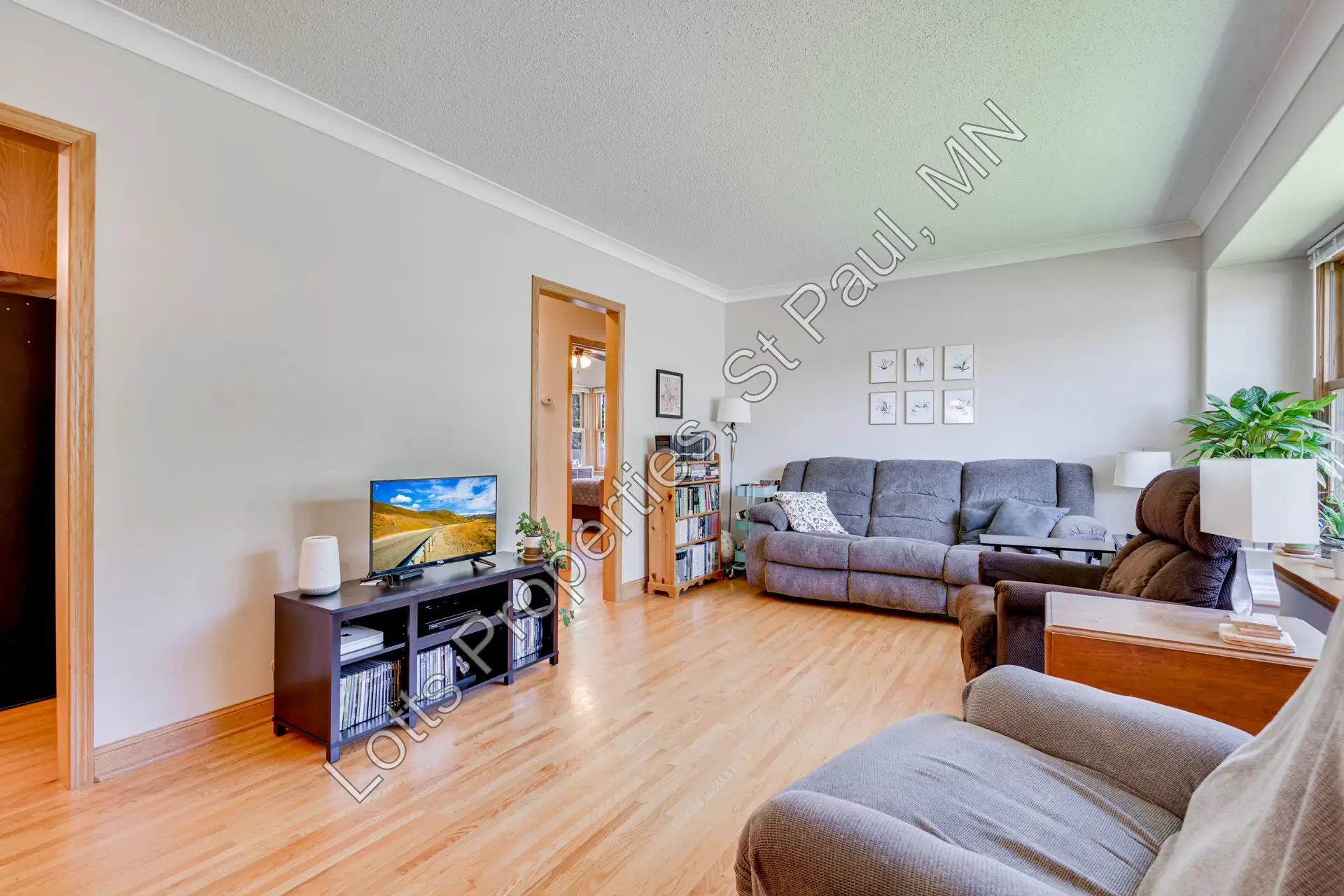 Living room opening toward the dining room at 1443 Saint Albans
