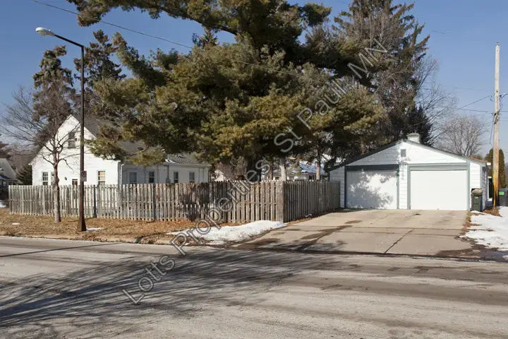 Driveway leading to the detached garage at 1444 Alameda before recent exterior updates
