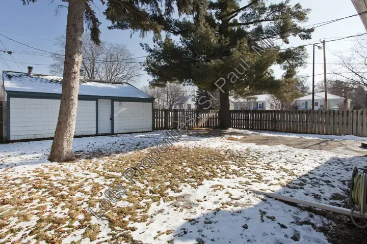 Side yard view before the home's exterior updates